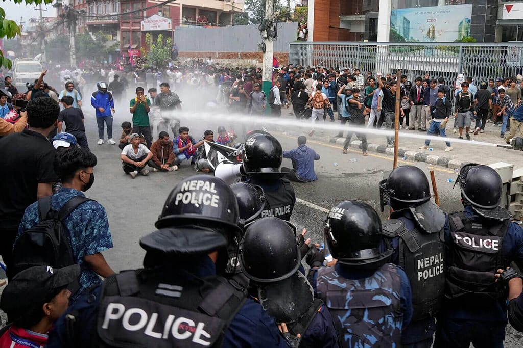 Nepal police shooting protesters in head